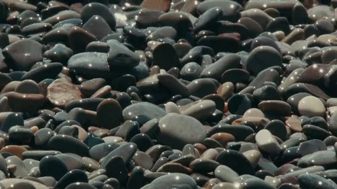 Close Up: Breaking waves on a rocky beach in Nizza. Stock Footage 69169311