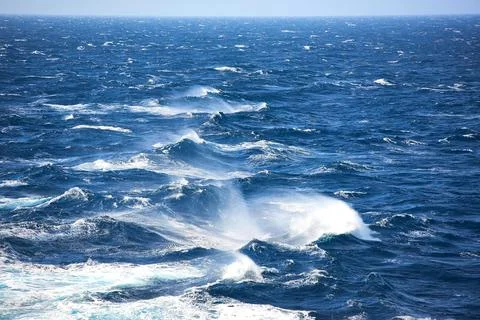 Close up of breaking waves with turquoise water and white foam in the Aegean  Stock Photos