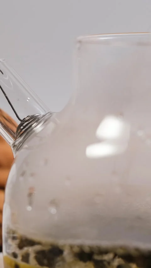 Close-up brewing tea with lemon slices Stock Footage 318315013