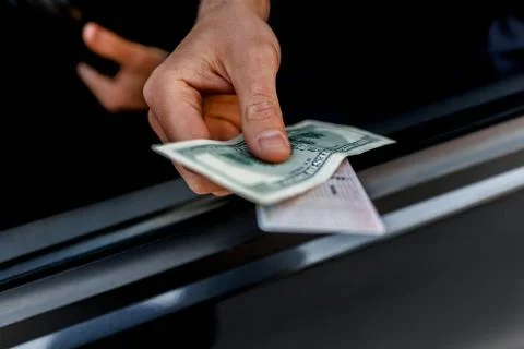 Close-up of a bribe on the road. Stock Photos