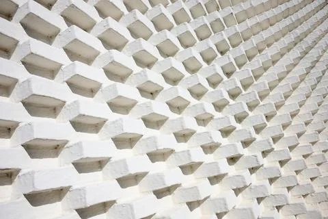 Close-up of a brick wall painted white. Stock Photos