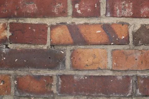 Close up of brick wall with red and brown bricks Stock Photos
