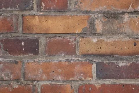 Close up of brick wall with red and brown bricks Stock Photos