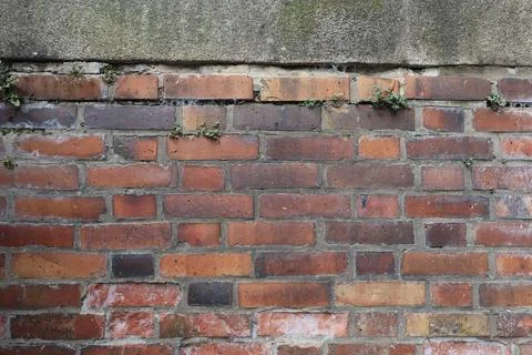 Close up of brick wall with red and brown bricks Stock Photos