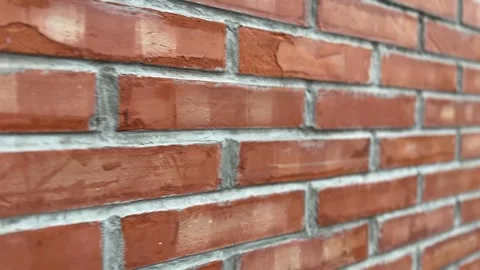 Close-up of brick wall texture with rough, weathered surfaces Stock Footage 312094937