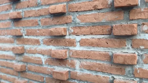 Close-up of brick wall texture with rough surface Video stock 312096822