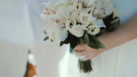 Close up bride with flower composition. Slow motion Stock Footage 92589106