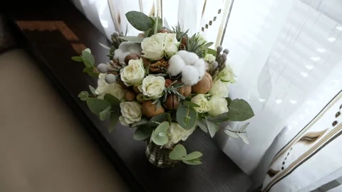 Close-up of the bride's bouquet against the background of a bright window Stock Footage 135396531