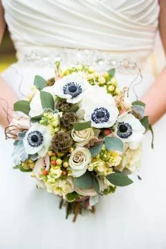 Close Up of Bride's White Floral Rustic Wedding Bouquet Stock Photos