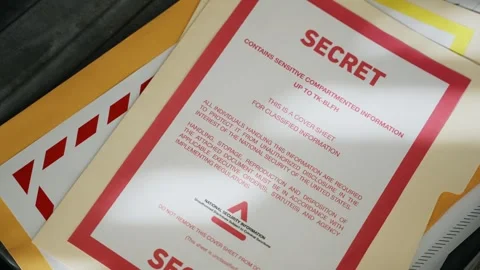 Close up on briefcase being opened revealing top secret envelopes and documents Stock Footage 304281692