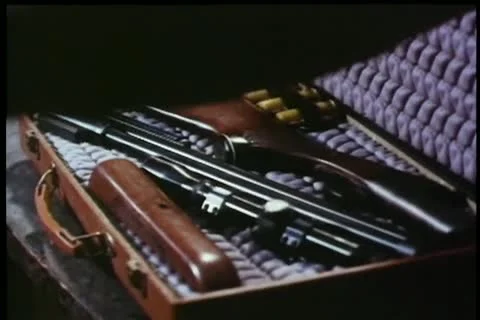 Close-up of briefcase containing gun Stock Footage 11345452