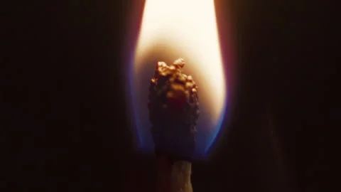 Close-up, bright fire of a match on a black background Stock Footage 337121144