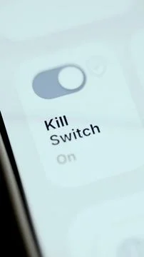 Close bright mobile control changing the kill switch from off to on Stock Photos