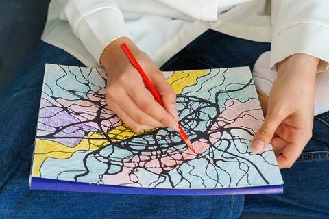 Close-up of  bright multi-colored, completed neurographics drawing. Girl dr.. Fotos Stock