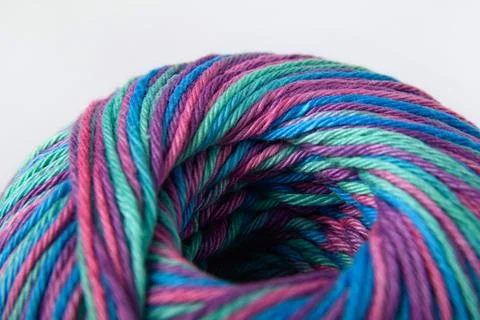 Close-up of brightly colored yarn with an emphasis on the texture. Stock Photos