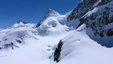 Close-up Brilliant view of snow covered mountain peaks Stock Footage 247797365