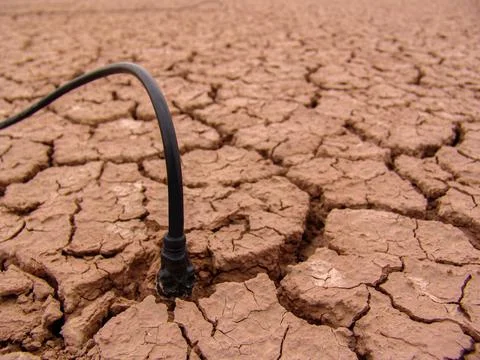 Close-up of broken and grunge texture of the arid floor Stock Photos