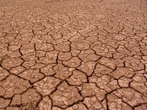Close-up of broken and grunge texture of the arid floor Stock Photos