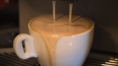 Close up of broken coffee machine poring too much coffee into the cup Stock Footage 106944429
