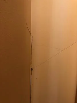 A close up of a broken corner wall Stock Photos