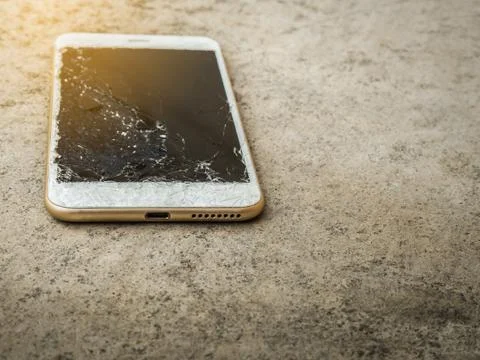 Close up of broken mobile phone drop Stock Photos