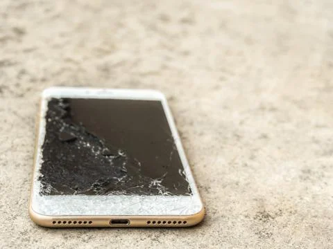 Close up of broken mobile phone drop Stock Photos