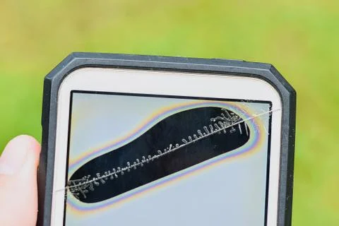 Close up broken screen and dead pixels mobile smartphone , Cracked smartphone in Stock Photos