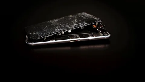Close up broken smartphone rotation on black background Stock Footage 98636593
