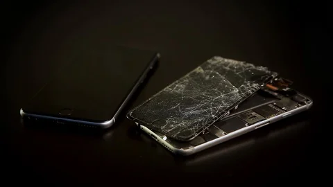 Close up broken smartphone rotation on black background Stock Footage 98636608
