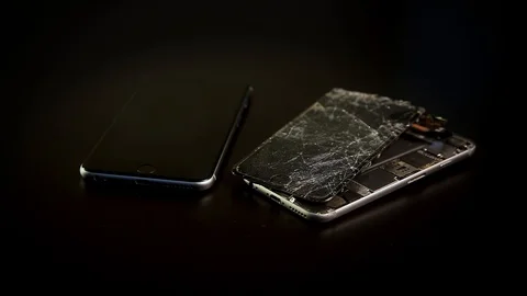Close up broken smartphone rotation on black background Stock Footage 98636622
