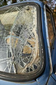 Close-up of broken windshield of an old car in an accident Stock Photos