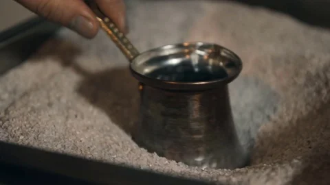 Close-up of bronze coffee making Stockbeeldmateriaal 71408925