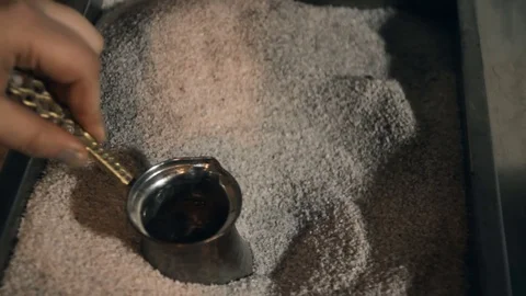 Close-up of bronze coffee making Stock Footage 71408981