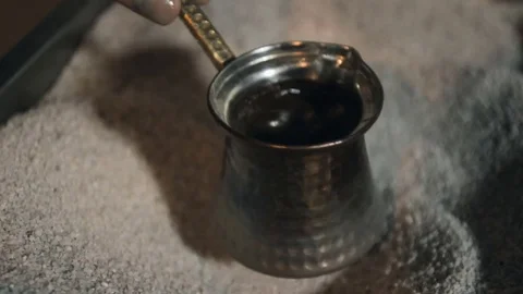 Close-up of bronze coffee making Stock Footage 73784055