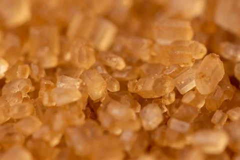 Close-up of brown cane sugar texture. Sweetness Stock-Fotos