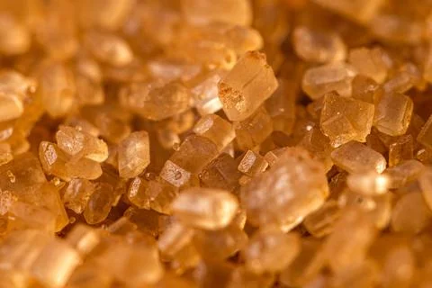 Close-up of brown cane sugar texture. Sweetness Stock-Fotos