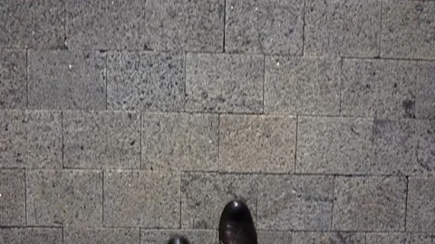 Close-up brown elegant boots go forward view from above. Stock Footage 221804082