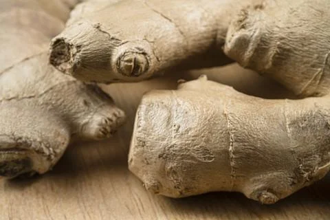 Close up of brown ginger root. Whole ginger root Stock Photos