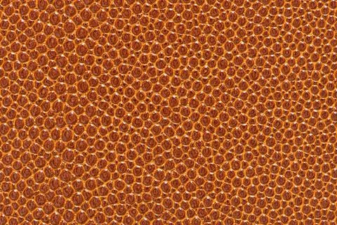 Close up of brown leather texture with embossed pebbled pattern and soft na.. Stock Photos