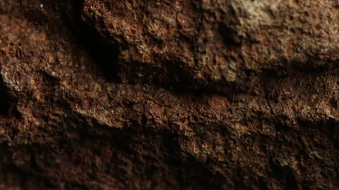 Close-up of brown rough stone surface Stock Footage 287875900