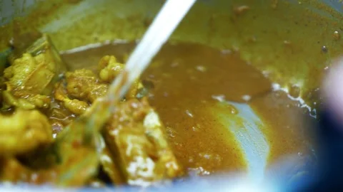 Close-up of brown soup in a rustic bowl, Close-up view of thick brown soup .. Video stock 346466498