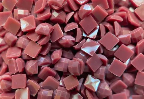 Close-up, brown square diamonds for diamond embroidery. Stock Photos