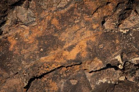 Close up of brown stone formation texture background Stock Photos