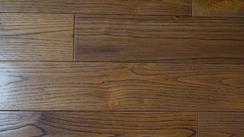 Close-up brown walnut Board floor hardwood parquet close-up with beautiful textu Stock Footage 118817946
