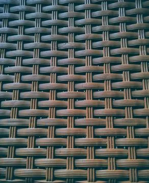 Close-Up Of Brown Woven Basket Pattern For Rustic Decor And Home Storage 写真素材
