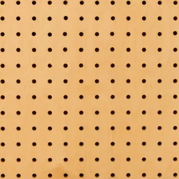 Close up of brown yellow wall surface holed grid texture. dot pattern Stock Photos