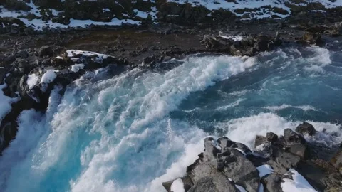 Close Up of Bruarfoss Water Current in Iceland with Turquoise River Flow in Stock Footage 332495389