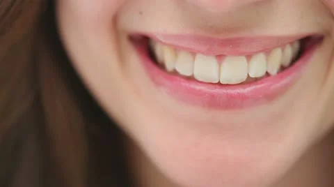 Close-up of a brunette woman smiling Stock Footage