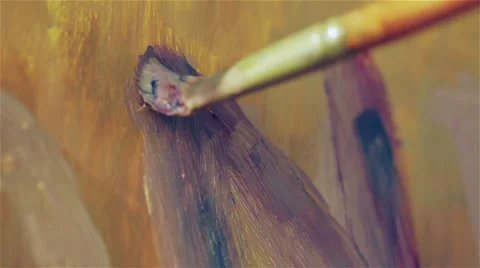 Close up of a brush that paints a canvas - painter Stock Footage 28314541