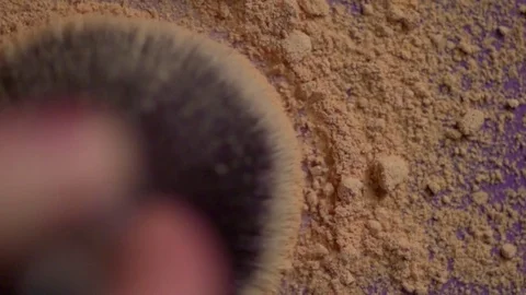 Close-up of brush spreading powder over the surface. Stock Footage 77578143